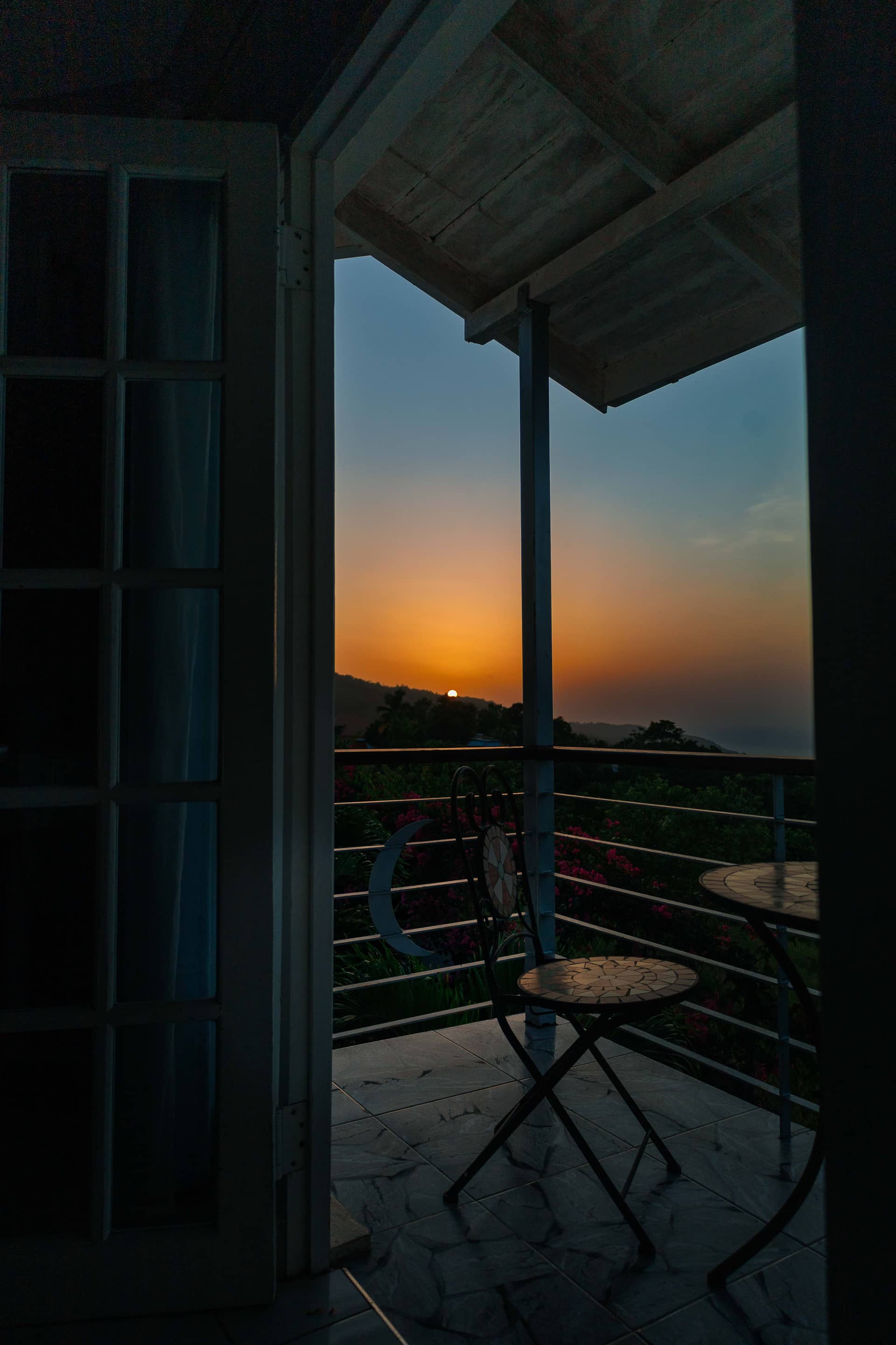 A table for two on a Lavender Moon balcony at sunset